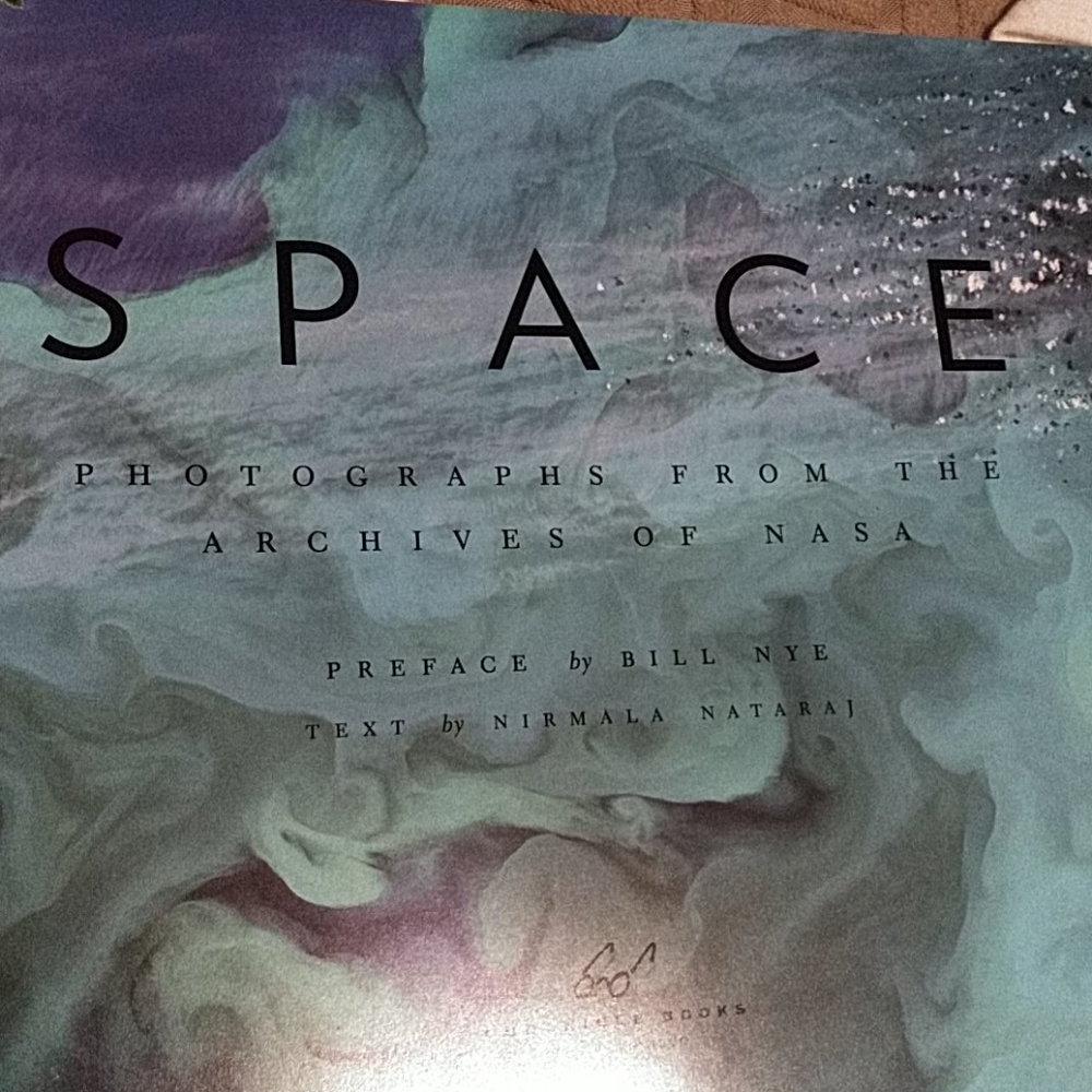 Earth and space book( NASA Photos)